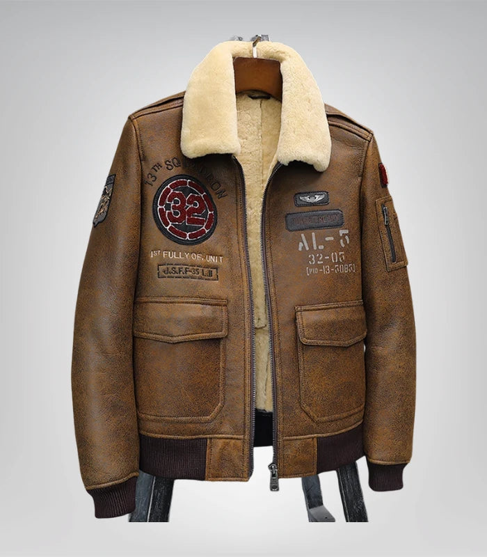 Brown embroidered shearling leather bomber jacket with fur collar