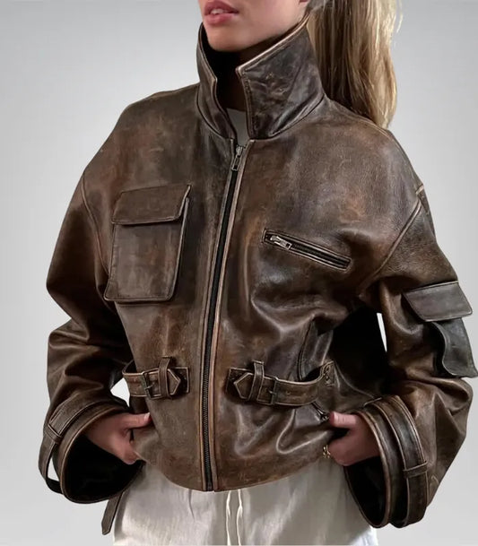 Vintage brown distressed leather jacket for women – cropped bomber coat with buckles