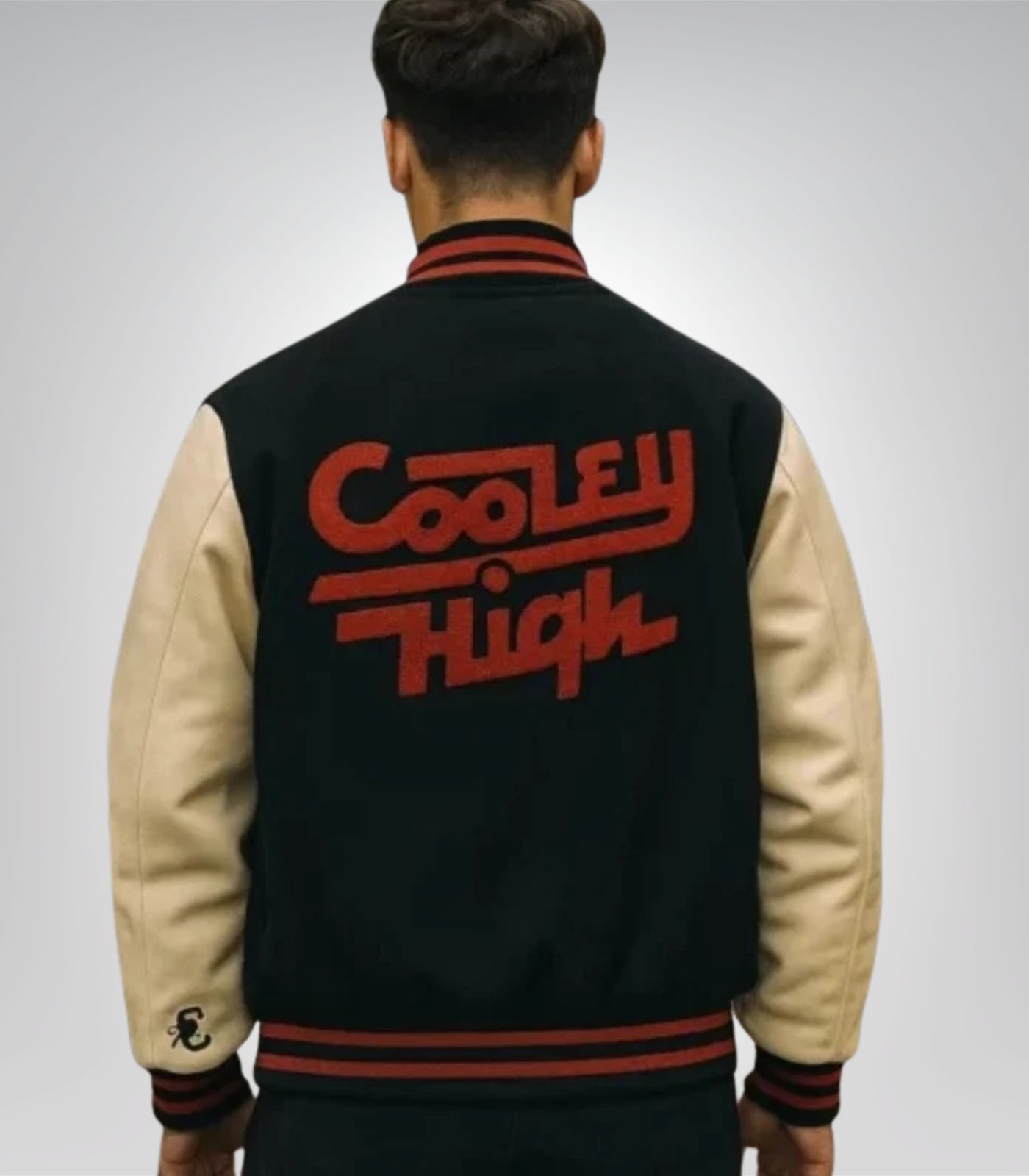 Black and off white wool varsity jacket with leather sleeves by Cooley High