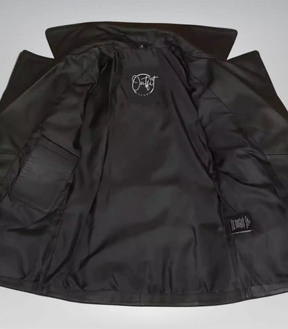 Stylish black leather longline moto jacket for women with belted waist