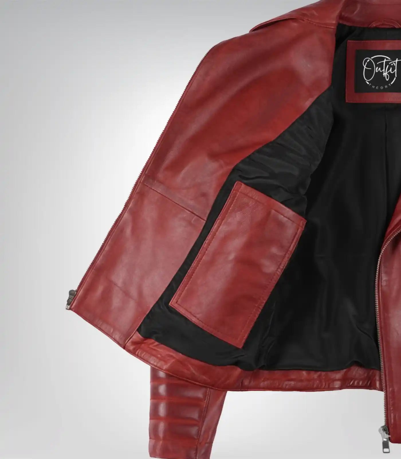Women’s stylish red leather biker jacket featuring asymmetrical front