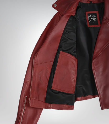 Women’s black leather biker jacket featuring belted waist