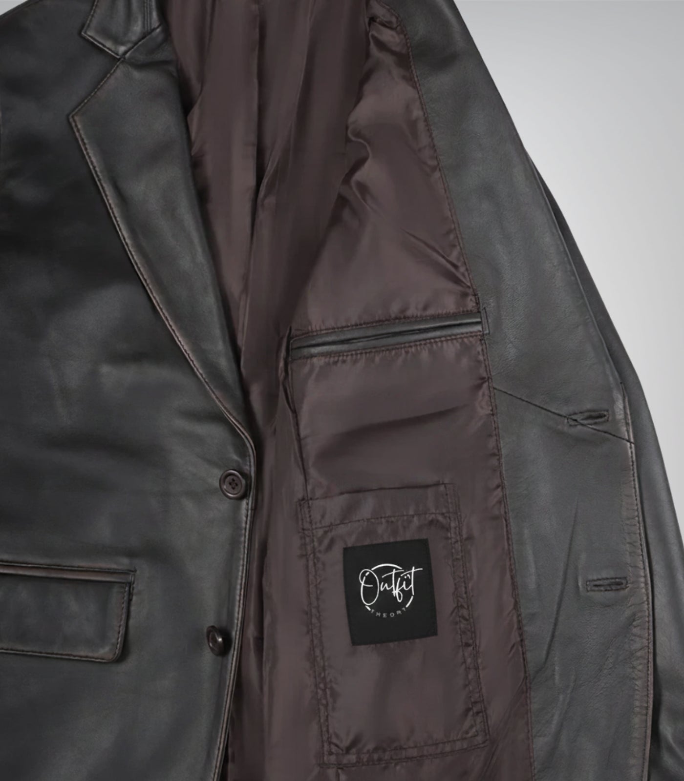 Stylish men’s distressed brown leather blazer featuring classic two-button design