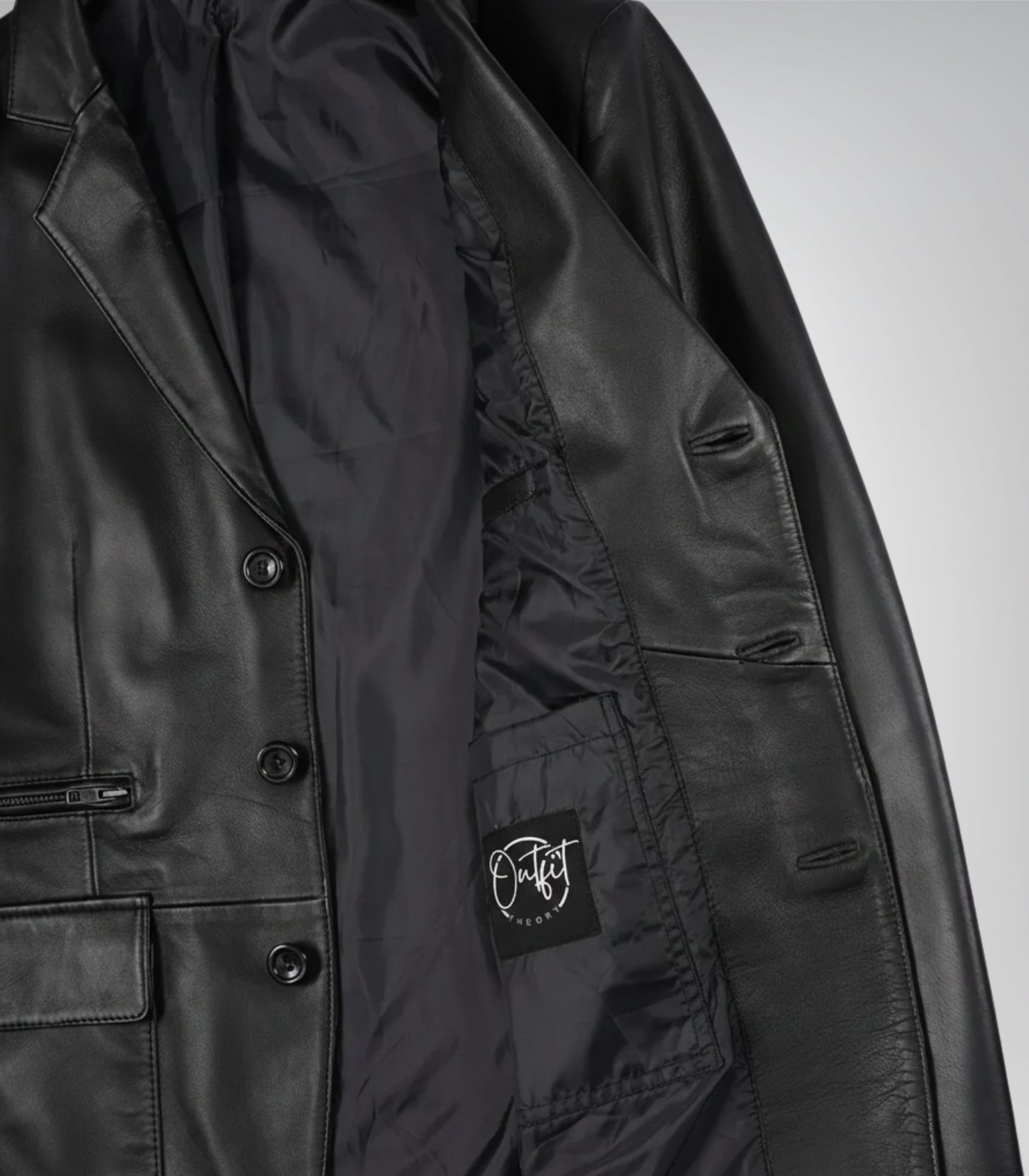 Stylish men’s black leather blazer featuring three-button design and traditional notch lapel