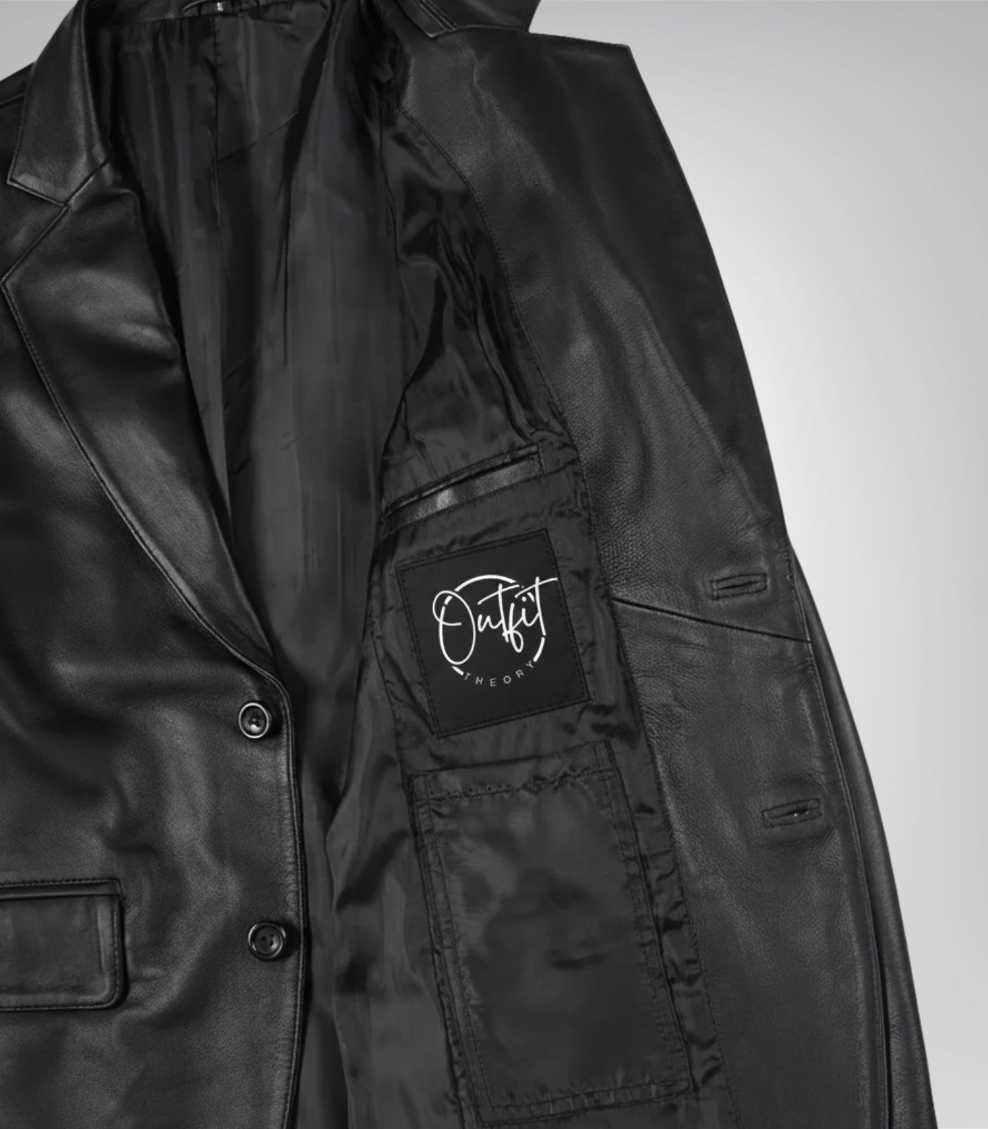 Stylish men’s black leather blazer featuring two-button design and notch lapel