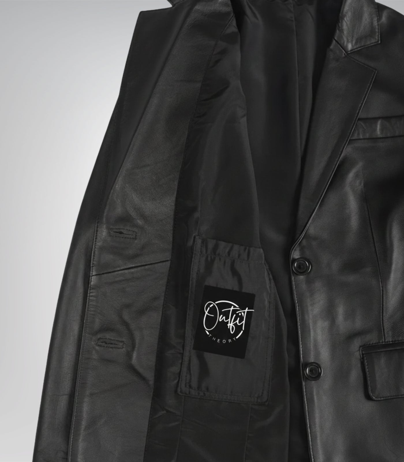 Stylish women’s black leather blazer featuring two-button design