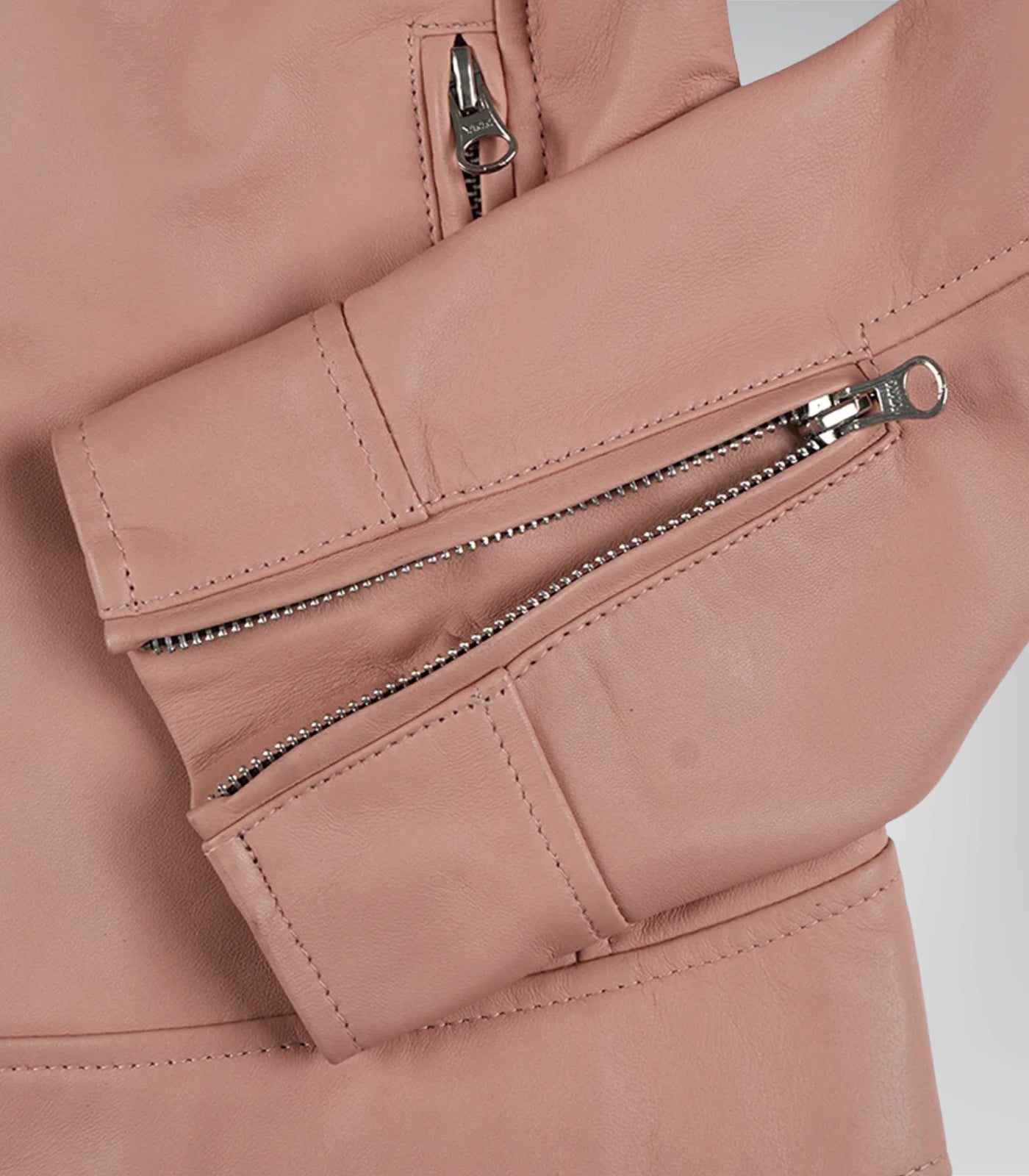 Light pink biker jacket for women crafted from genuine leather